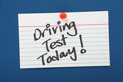 A note that says driving test today